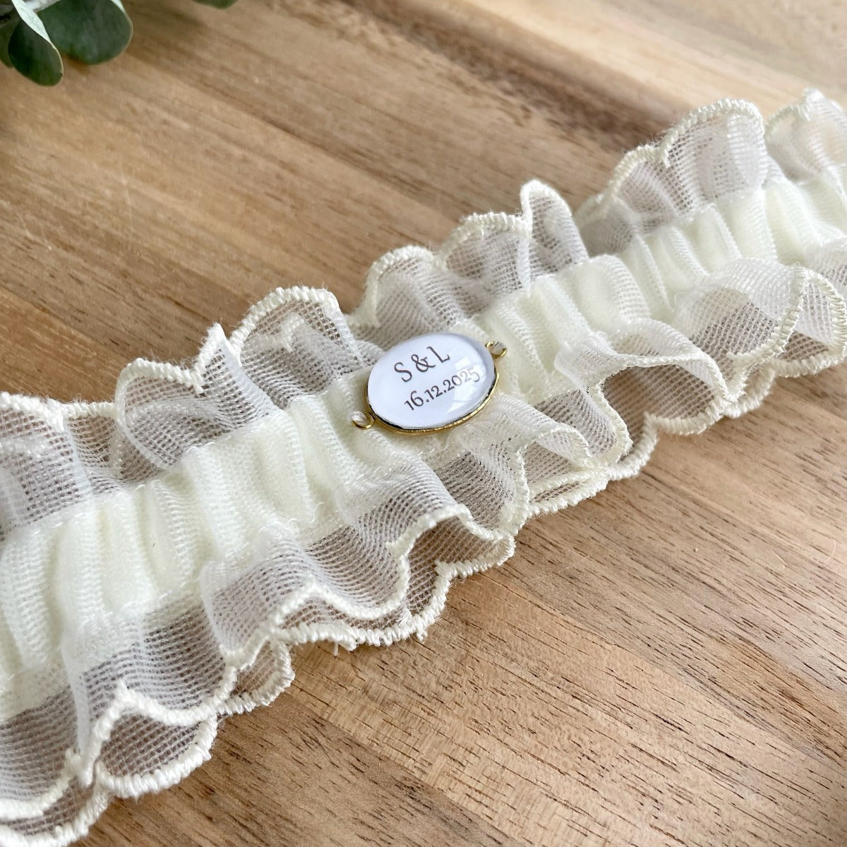 Elegantes Strumpfband als besonderes Accessoire für die Braut.