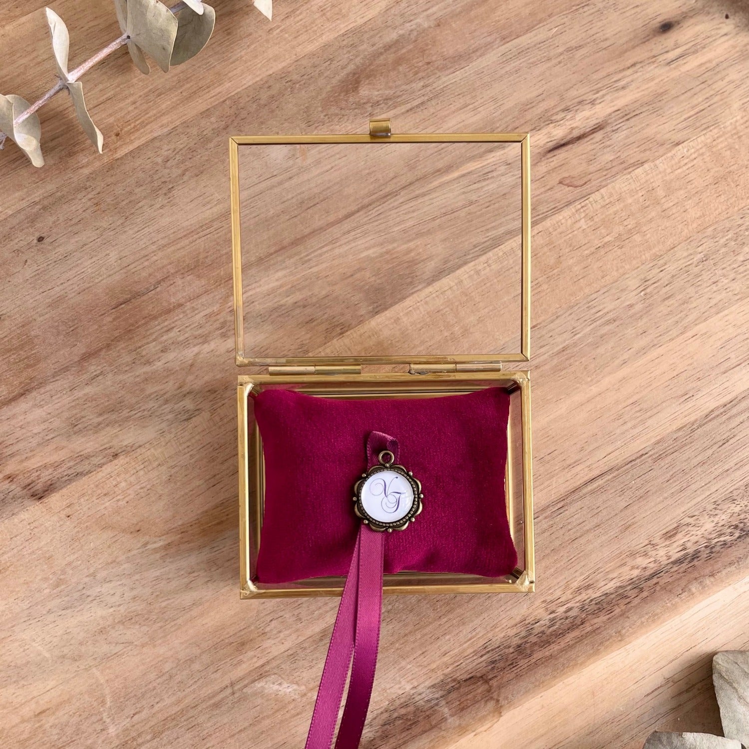 Ring box with ruby red cushion
