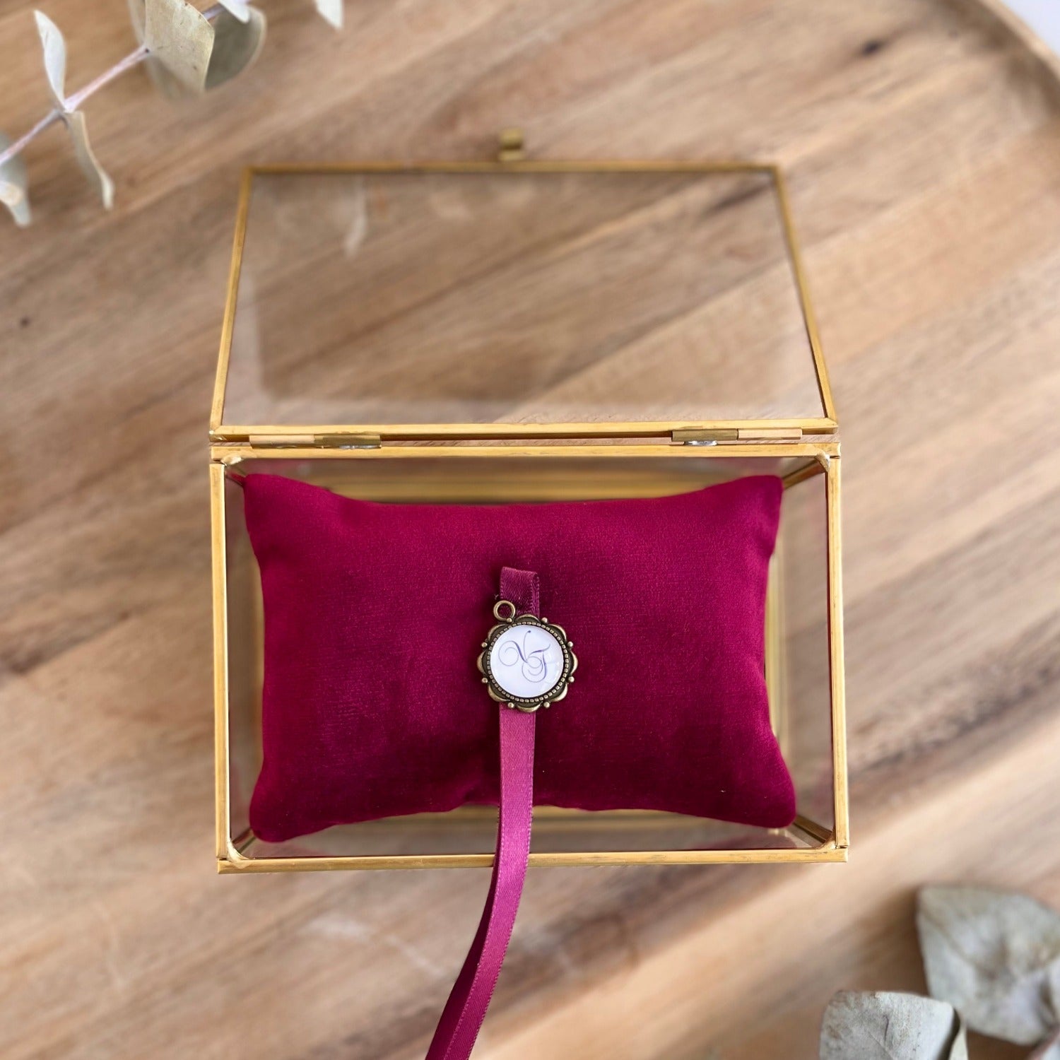 Ring box with ruby red cushion