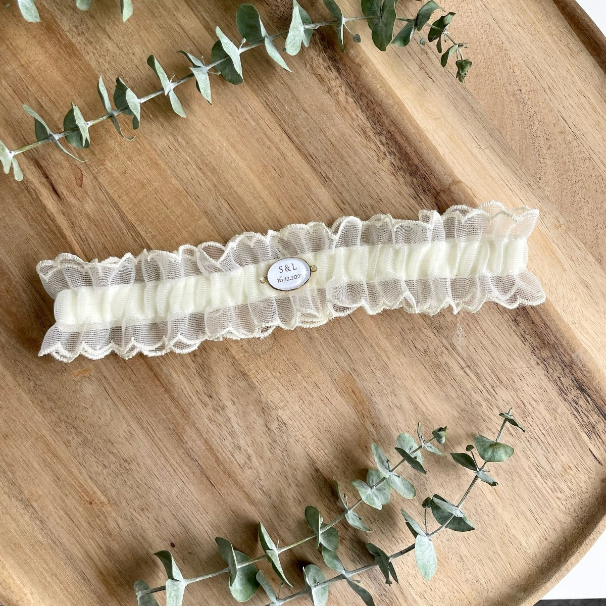 Klassisches Strumpfband aus feiner Spitze für die Hochzeit.