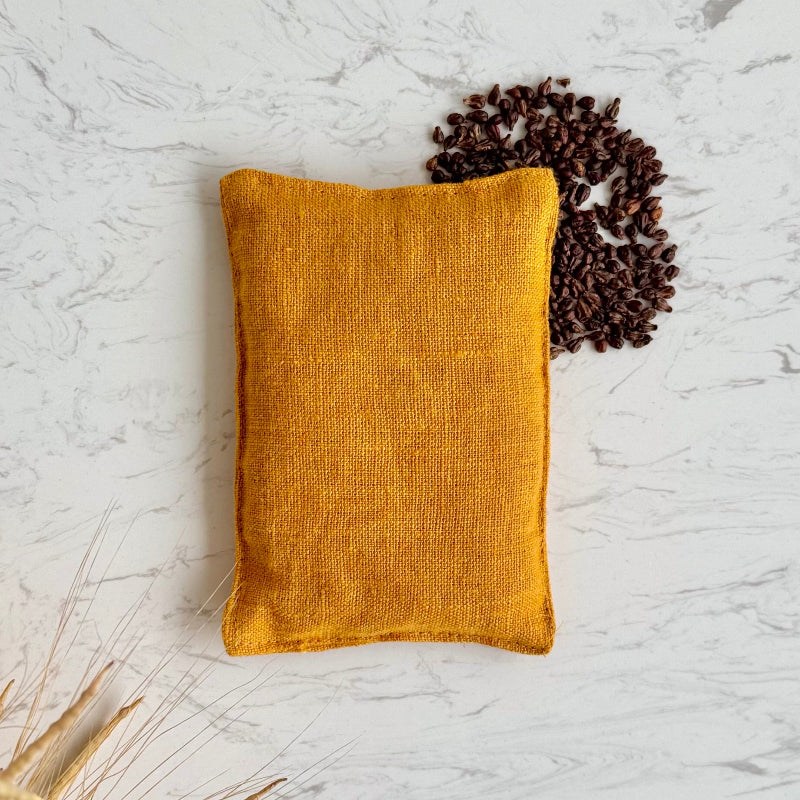 Handwaermekissen aus Leinen in Kurkuma farben