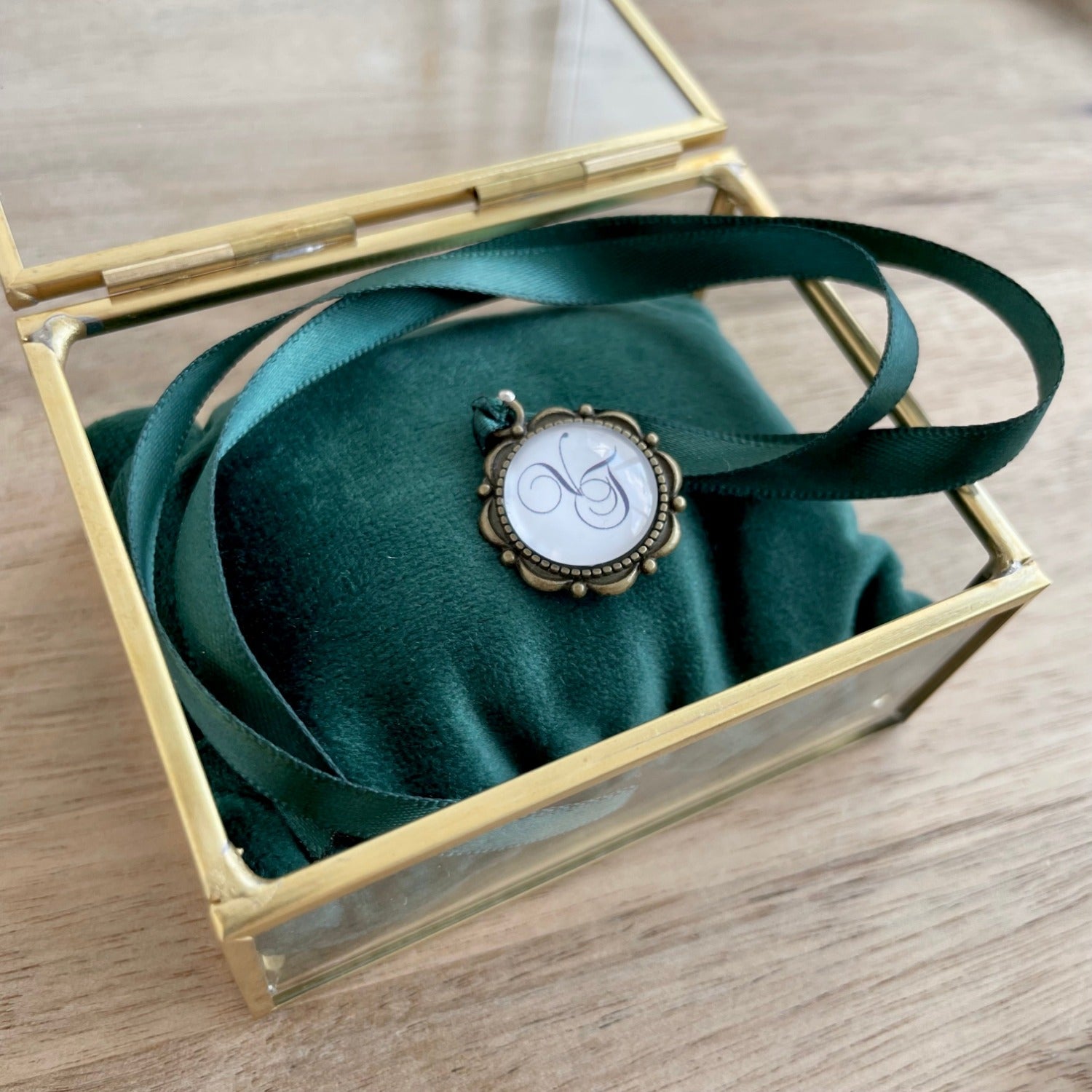 Ring Box with Green Pillow