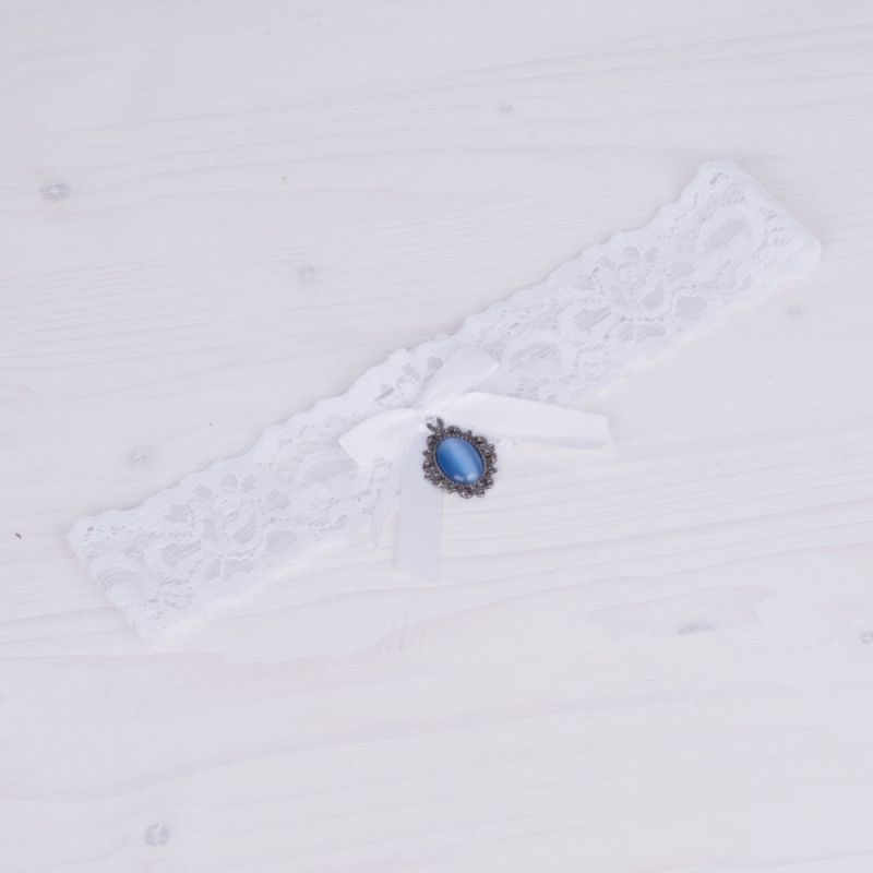 Strumpfband aus weißer Spitze mit blauem Stein für die Hochzeit.